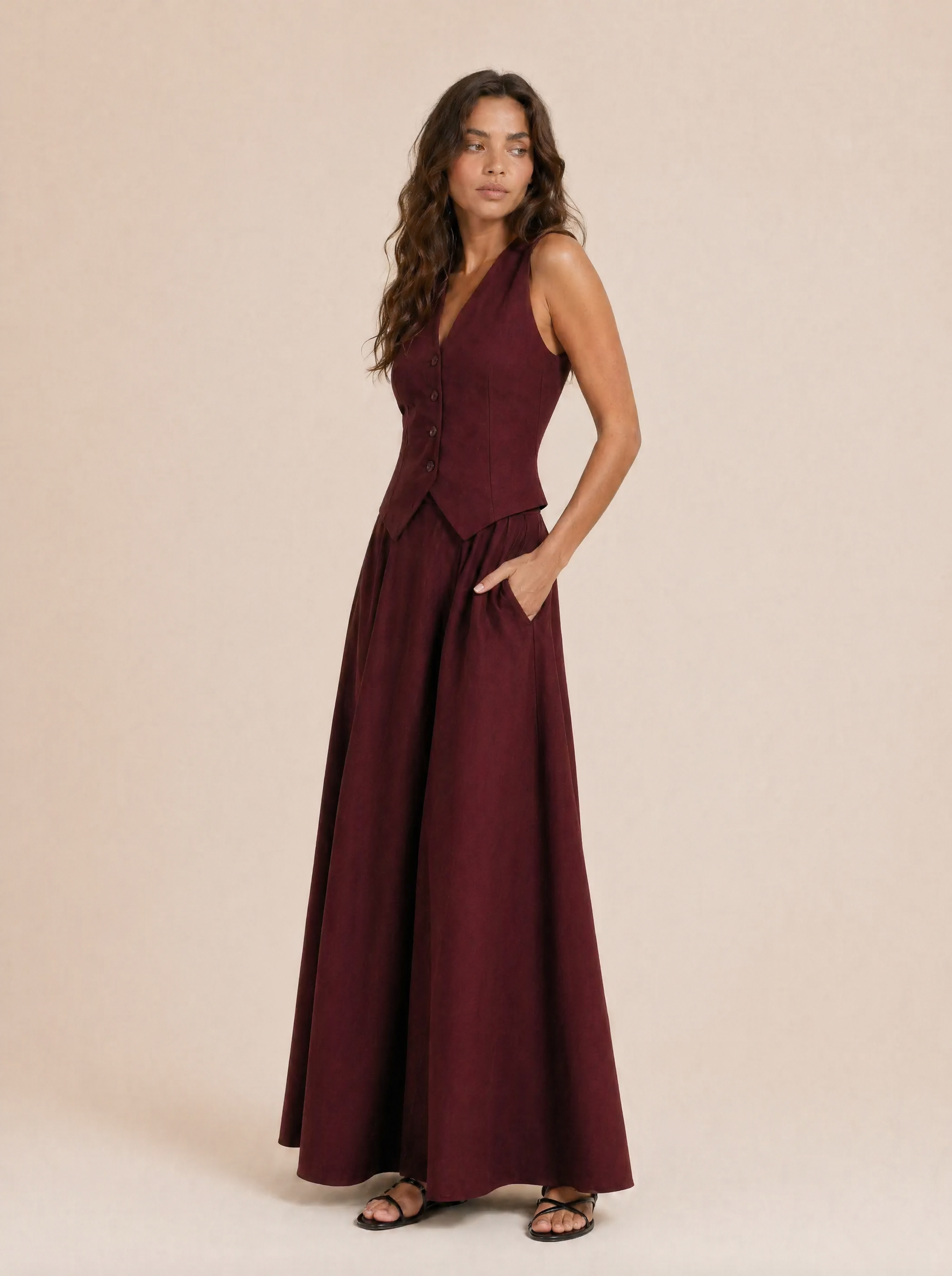 Tailored V-Neck Waistcoat & Pocket Maxi Skirt Set in Burgundy — 3/4 angle view
